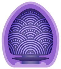 a purple egg on a white background