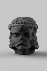 a black statue of a head on a gray background