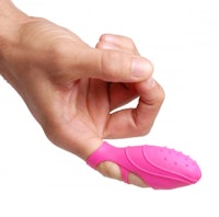 a hand holding a pink sex toy