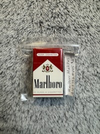 a pack of marlboro cigarettes in a plastic bag