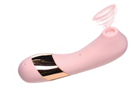 a pink sex toy with a gold handle