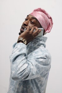 a man talking on a cell phone