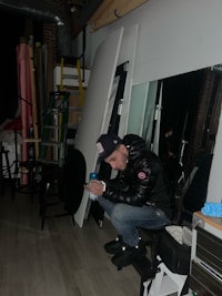 a man crouching on the floor
