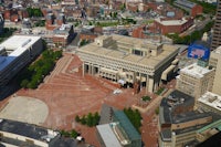 an aerial view of a city from the top of a building
