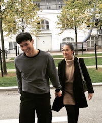a man holding a woman's hand