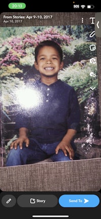 a photo of a boy with a smile on his face