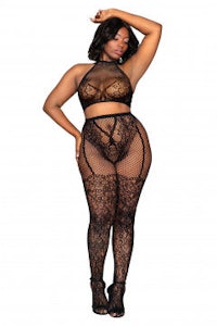 a woman in a black lace bodysuit posing