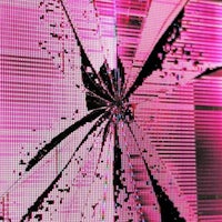 a pink shattered glass on a wall