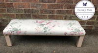 a bench with a floral pattern on it