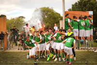 a group of soccer players on a field