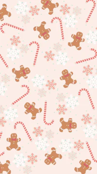 gingerbread and candy canes on a pink background