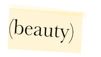 a yellow post it note with the word beauty written on it