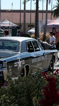 a silver car parked in a parking lot
