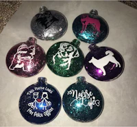 a group of ornaments with dogs on them
