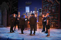a group of people standing on a stage