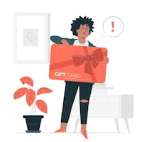 a woman holding a gift card in front of a room
