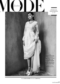 the cover of mode magazine featuring a woman in a white dress