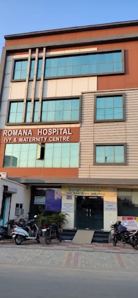 a building with motorcycles parked in front of it