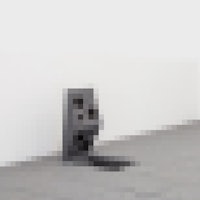 a black and white image of a chair in an empty room