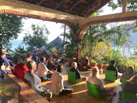 a group of people sitting in chairs