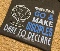 a t - shirt that says go make disciples dare to declare