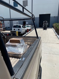 the back of a truck with a box in it