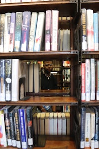 a book shelf with many books on it