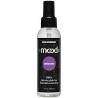 a bottle of mood silicone spray on a white background