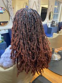 the back of a woman's hair in a salon