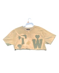 a cropped t - shirt with the word w on it