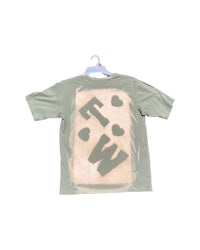 a green t - shirt with a heart on it