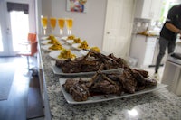 a kitchen with a lot of food on a counter