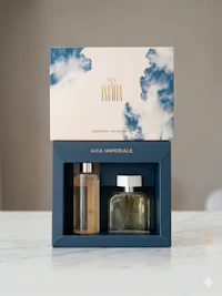 a bottle of perfume and a box on a table