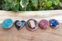 a group of stones on a wooden table