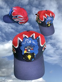a hat with a red, blue, and white design on it