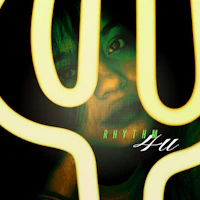 an image of a woman with a neon light in her face