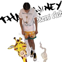 a man wearing a t - shirt with a giraffe on it