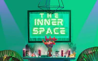 the inner space is a neon sign in front of a table