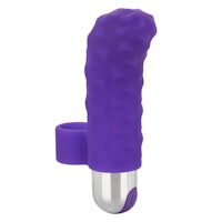 a purple sex toy on a white background