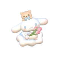 a figurine of a teddy bear holding a bouquet of flowers