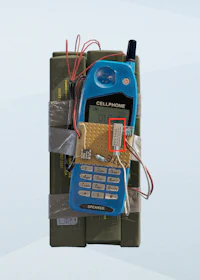 a cell phone with wires attached to it