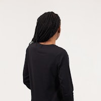 the back of a woman wearing a black long - sleeved tee