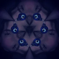 a man with blue eyes in a circular pattern