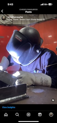 a man is welding a piece of metal
