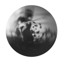 a black and white photograph of a circular object