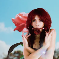 a woman with red hair holding a rose