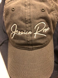 a hat with the word jessica roe on it