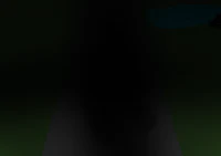 a black and white image of a person in a dark room