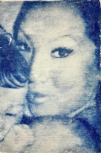 a photo of a woman holding a baby