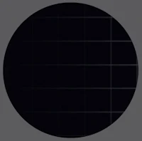 a black circle with a grid on it